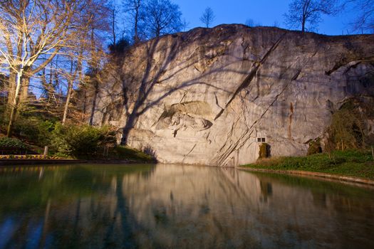 dying lion monument in Lucern Switzerland at dusk