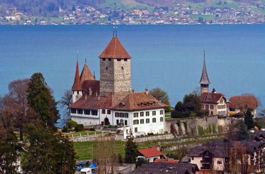 Landscape of Spiez Church with Lake of Thun from Train Station, Switzerland