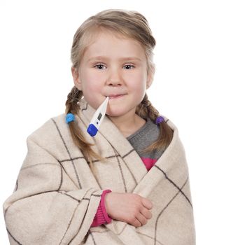 Sick child with a thermometer on white background