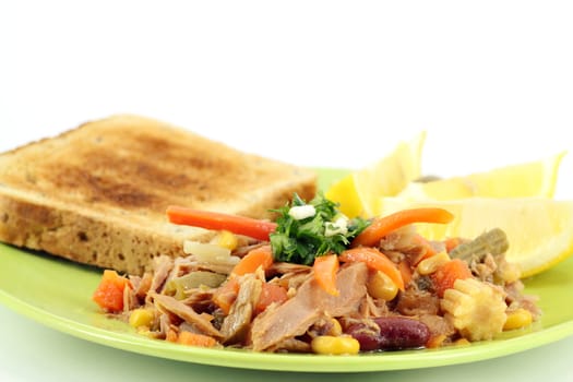 tuna fish with salad and bread