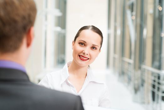 business woman with a colleague discussing documents in the office