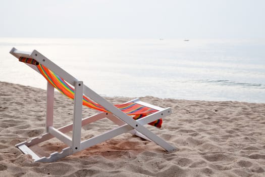 beach chair on tropical white sand