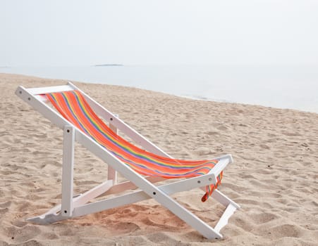 beach chair on tropical white sand