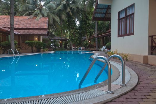 swimming pool and chairs