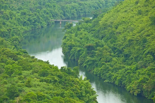 Bridge to the jungle mountain and river in Thailand