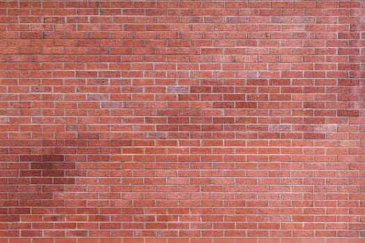 Close-up on the red brick wall