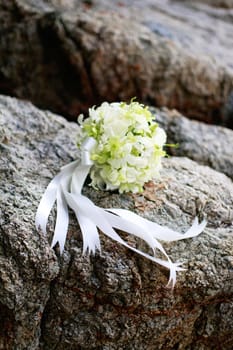 Beautiful wedding bouquet of white orchids and roses.