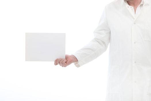 Lab worker holding a small blank poster in his hand with space to put your message or text
