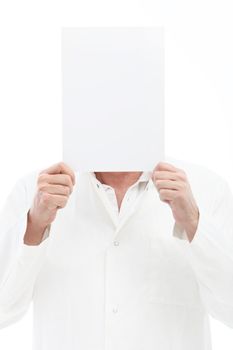 Man holding blank note over his head isolated on white