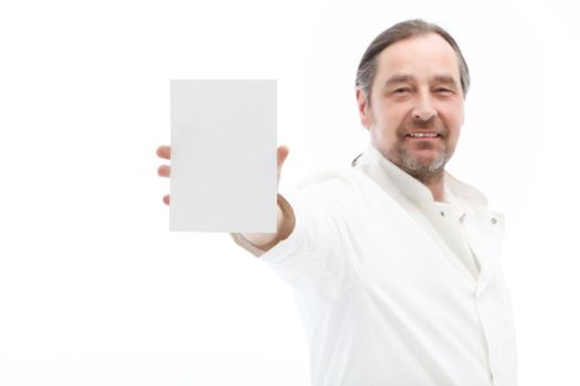Mature man holding blank note isolated on white