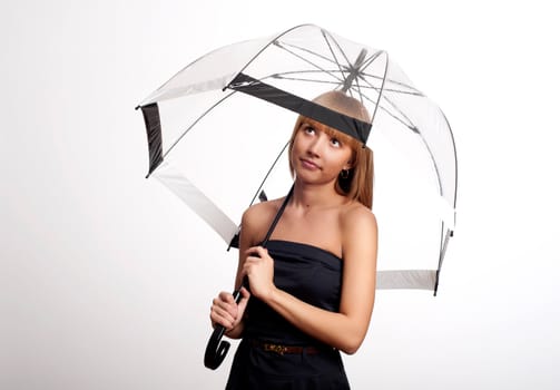 Young fashionable woman smile and holding umbrella