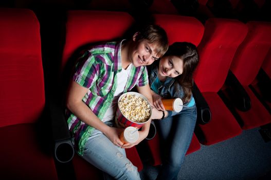 couple in a movie theater, watching a 3D movie