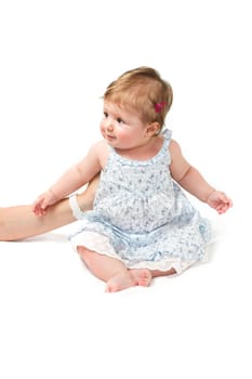 Happy baby sitting on white towel