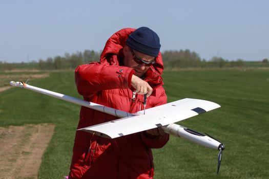 Man makes the assembly RC glider