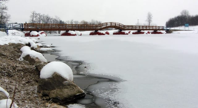 Frozen river covered with snow.