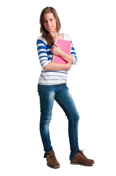 Young woman carrying notebooks in her arms