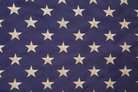 Embroidered white stars on a field of blue which represents the union on the American flag