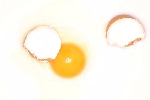 a broken egg on isolated white background