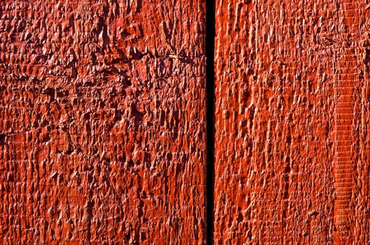 Background of wooden board plank wall painted red. Wood surface textures.