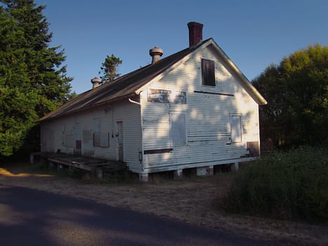 A photograph of an old abandoned building.