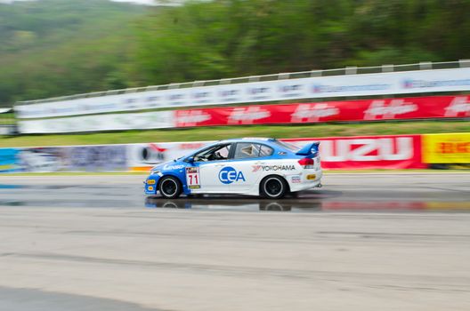 Nakhon Ratchasima, Thailand - March 9th:Unidentified car racing competitors during the "Thailand circuit 2013  " at Bonanza speedway on March 9th, 2013 in Nakhon Ratchasima, Thailand. 