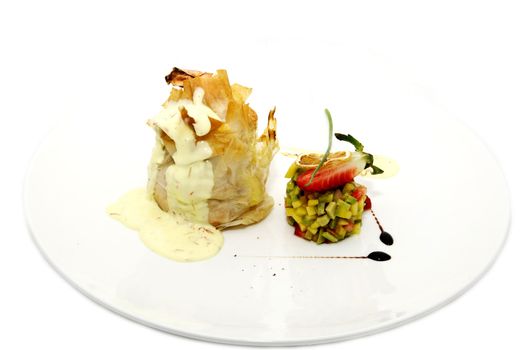 cabbage pie and garnish on a plate and a white background