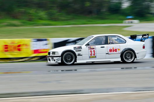 Nakhon Ratchasima, Thailand - March 9th:Unidentified car racing competitors during the "Thailand circuit 2013  " at Bonanza speedway on March 9th, 2013 in Nakhon Ratchasima, Thailand. 