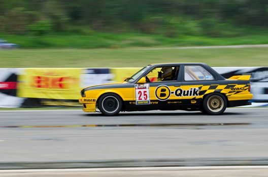 Nakhon Ratchasima, Thailand - March 9th:Unidentified car racing competitors during the "Thailand circuit 2013  " at Bonanza speedway on March 9th, 2013 in Nakhon Ratchasima, Thailand.