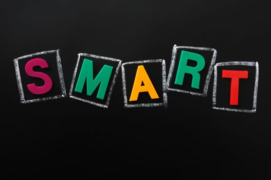 SMART - word made of color letters on a blackboard