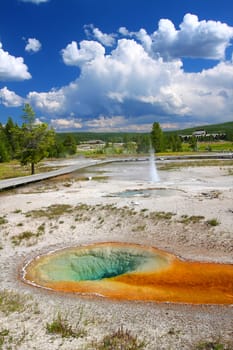 Beautiful landscape of Yellowstone National Park Upper Geyser Basin with Belgian Pool seen in the foreground.