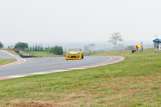 Nakhon Ratchasima, Thailand - March 9th:Unidentified car racing competitors during the "Thailand circuit 2013  " at Bonanza speedway on March 9th, 2013 in Nakhon Ratchasima, Thailand. 