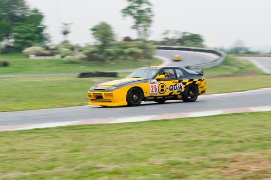 Nakhon Ratchasima, Thailand - March 9th:Unidentified car racing competitors during the "Thailand circuit 2013  " at Bonanza speedway on March 9th, 2013 in Nakhon Ratchasima, Thailand. 