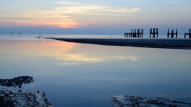 beautiful sunrise reflect on the smooth ocean