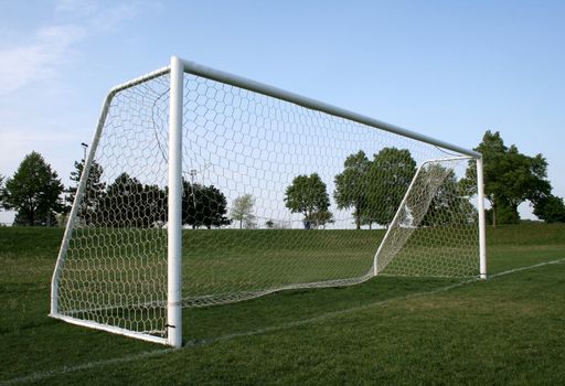 A vacant soccer goal.