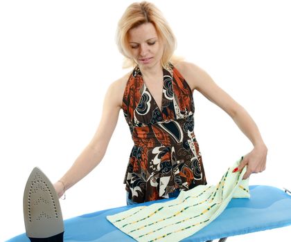 Beautiful housewife ironing the laundry on white background