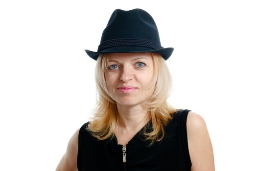 smiling woman with a black hat and black shirt on white background