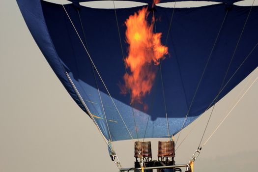 air-balloon engines burning to heat the air