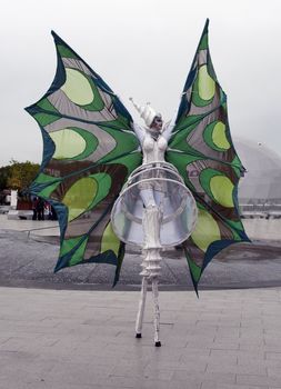 VENLO,HOLLAND - MAY 08:Unidentified woman dancing at the entrance of the Floriade ,the floriade is the World Horticultural Expo on May 08, 2012 in Venlo, Holland.