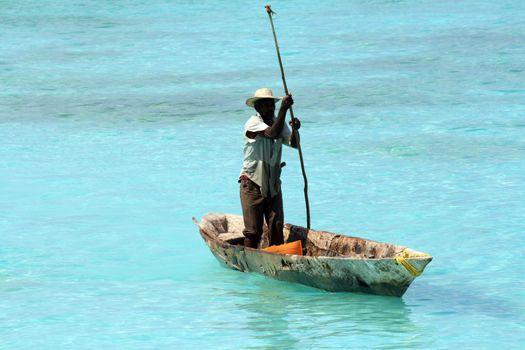 A fisherman in Zanzibar on a quiet sunny day