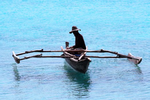 A fisherman in Zanzibar on a quiet sunny day