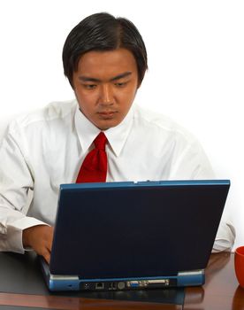 Office Worker Using A Computer To Browse Internet