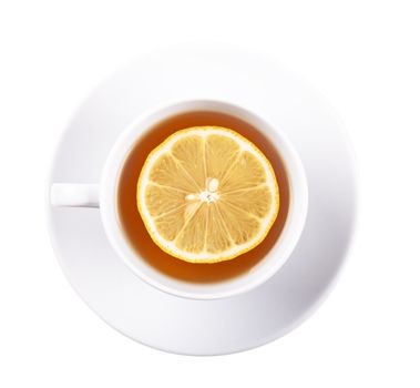 Top view of white cup of green tea with lemon on a white plate isolated over white background