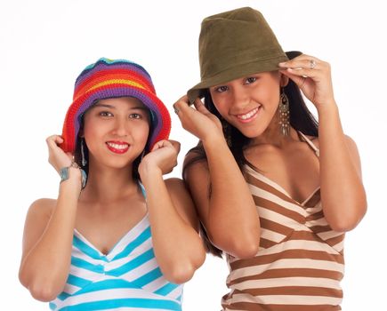 Happy Young Teenage Girls Wearing Hats