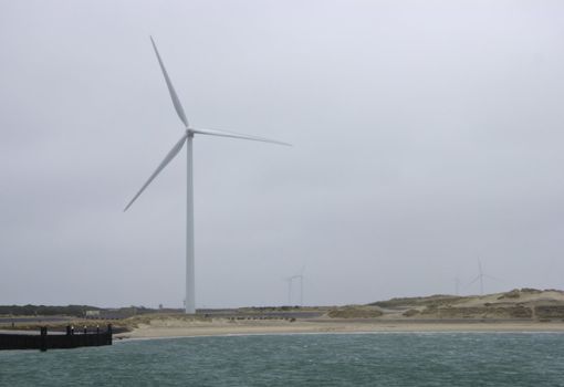 Wind turbines farm in the coast