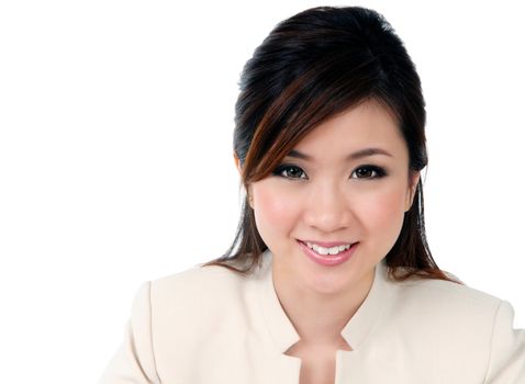 Portrait of an attractive young businesswoman smiling over white background.