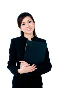 Portrait of an attractive young businesswoman holding file over white background.