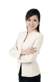 Portrait of a beautiful young businesswoman smiling, over white background.