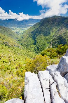 View from Takaka hill with its limestone outcroppings into Takaka valley, South Island, New Zealand