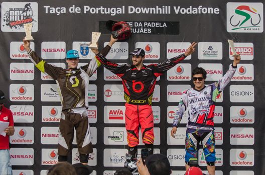 VIANA DO CASTELO, PORTUGAL - MAY 13: Jose Borges, Antonio Pajuelo and Emanuel Pombo at the podium on the 4th Stage of the Taca de Portugal Downhill Vodafone on may 13, 2012 in Viana do Castelo, Portugal.