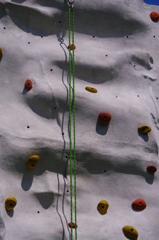 grey artificial climbing wall inside